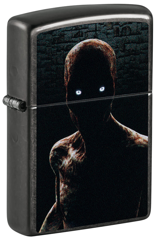 Black Zippo lighter with a spooky figure design P1