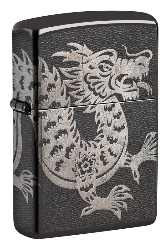 A black Zippo lighter featuring a detailed silver dragon design P1