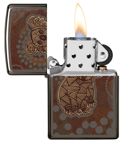 Zippo lighter front view Black Ice® opened and lit with coloured image of a koala in the style of Aboriginal art.