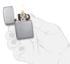 Zippo Lighter 1941 Replica front view opened and lighted in brushed chrome look in stylized hand