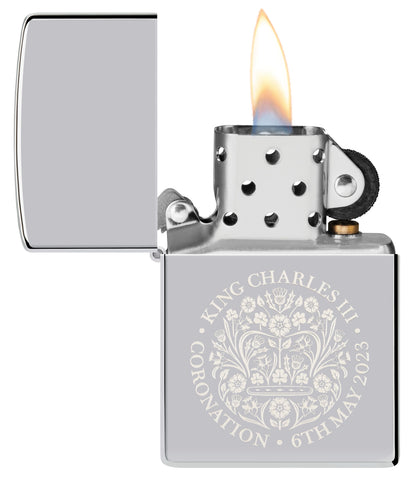 Front view of the open Zippo King Charles Coronation storm lighter, with flame