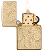 Zippo Lighter Front View Armor® highly polished brass opened and lit with deeply engraved squiggly lines