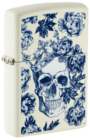 Zippo lighter front view ¾ angle glows in the dark skull with crown surrounded by blue flowers