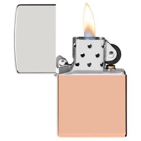 Front view of the Zippo Bimetal Case Copper storm lighter open, with flame