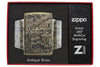 Armor® Antique Brass Skull Design Windproof Lighter in its packaging