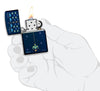 Pixel Game Navy Matte windproof lighter lit in hand