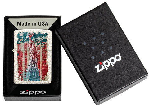 Zippo lighter front view Mercury Glass with coloured image of the Statue of Liberty and American flag in the background in opened gift box
