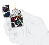 Zippo Lighter front view Skulls Design with some multicolored skulls shining in the night in stylised hand