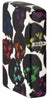 Zippo Lighter Side View back ¾ angle Skulls Design with some multicolored skulls shining in the night